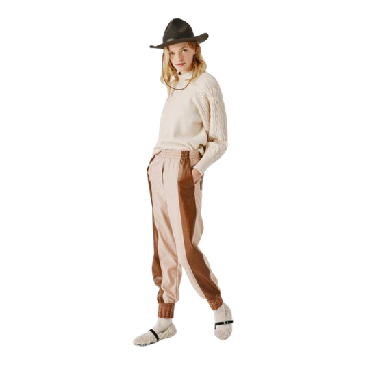 Pantaloni con inserto in eco-pelle e maglia